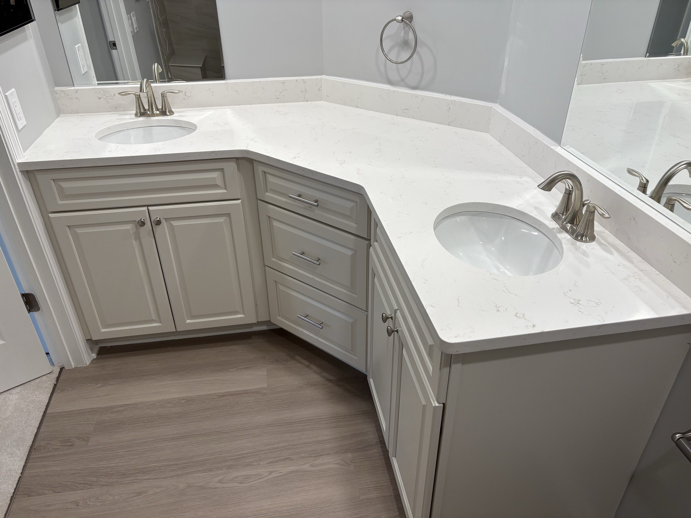 Corner double-sink vanity with quartz counter